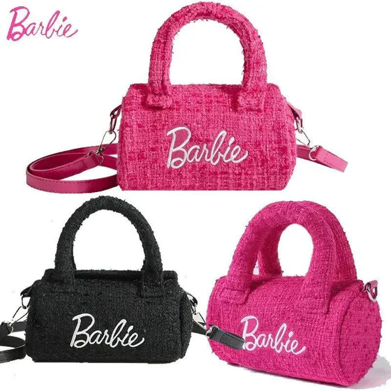 Women Fashion Pillow Barbie Hand Bags, pink and black cylindrical bags with unique design.