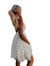 Women sexy floral white mini lace backless sheer dress with V-neck and spaghetti straps.