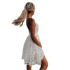 Women Sexy Floral White Mini Lace Backless Sheer Dress with V-neck and spaghetti straps.