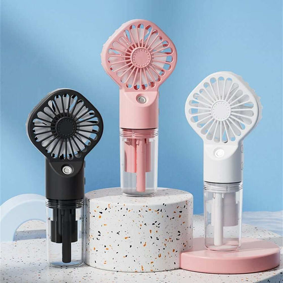 Portable mist fans with USB charging in black, pink, and white on display.