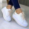 Women's platform sneakers with floral embroidery design, comfortable and stylish, suitable for everyday wear.