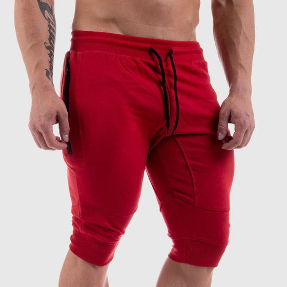 Red fashion sports fitness shorts for men made of high-quality cotton.