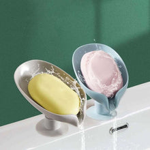  Soap dish shelf with double drain holes holding yellow and pink soaps, featuring a vertical perforation-free design.