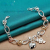 Silver Love Key Bracelet with retro ethnic design and romantic charm.