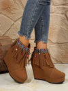 Fringe Suede Wedge Boots with decorative fringe and beaded details.