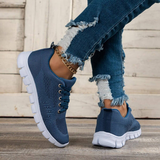 Fashion Blue Running Soft Bottom Comfortable Women's Shoes on wooden floor.