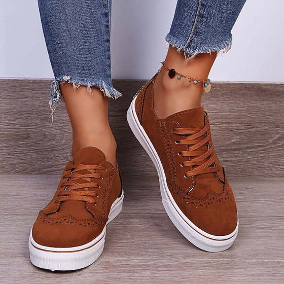 Lace-Up Suedette Flat Sneakers For WomenThese Lace-Up Suedette Flat Sneakers are the perfect combination of style and comfort. Made with elastomer and suede materials, they provide a snug and durable fit. Plush Fashion ShopPlush Fashion ShopSuedette Flat Sneakers