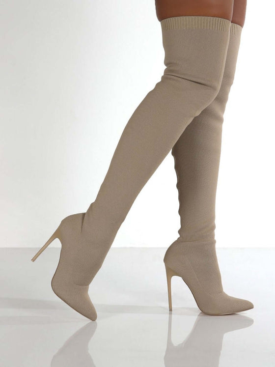 Point toe over knee stiletto boots in beige, high heel, sophisticated style.