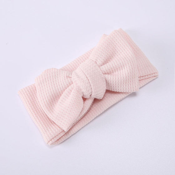 Infant Oversized Bow Hair BandAdd the perfect finishing touch to your little one's outfit with our Infant Oversized Bow Hair Band. Made with high-quality fabric and crafted with knitting technolohead bandPlush Fashions ShopPlush Fashion ShopInfant Oversized Bow Hair Band