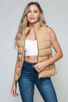  Snobbish Zip Up Turtleneck Vest with PocketsElevate your outfit with the Snobbish Zip Up Turtleneck Vest with Pockets. Designed with a convenient zip-up front closure and cozy turtleneck, this versatile vest oVestPlush Fashion ShopPlush Fashion ShopSnobbish Zip