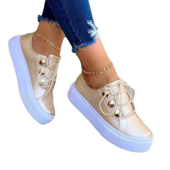 Lace-up Flats Sneakers Women with Rivet Detailing and Casual Style.