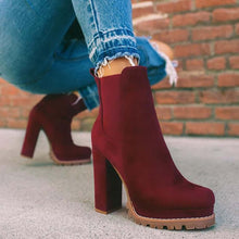  Round-toe ankle boots with leopard print, thick square high heels, and waterproof platform.