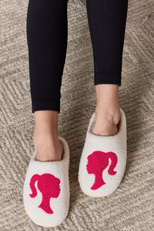  Melody Graphic Cozy SlippersStep into warmth and style with Melody Graphic Cozy Slippers. Made with plush material and festive details, these flats offer comfort and fashion for the winter seasSlippersPlush Fashion ShopPlush Fashion ShopMelody Graphic Cozy Slippers