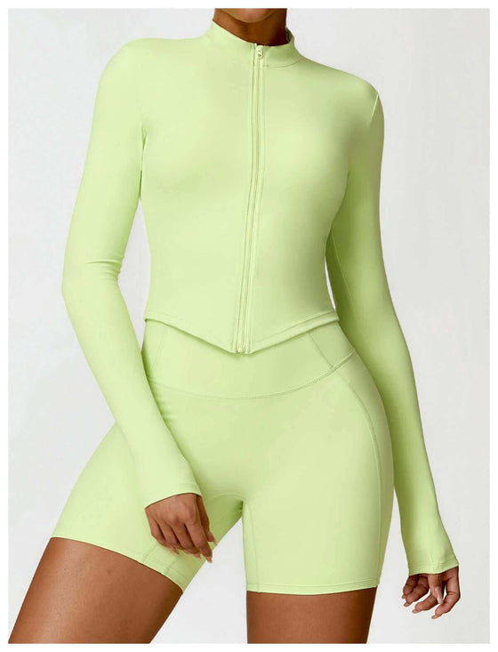 Women's tight long sleeve yoga wear in chartreuse, featuring nylon fabric for comfort and support.