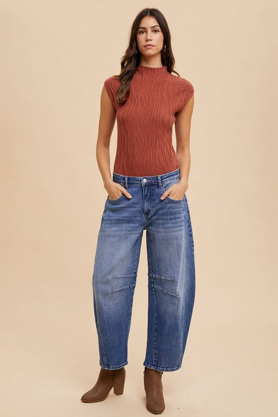 Annie Wear Mid Rise Barrel Leg Jeans with pockets on model.