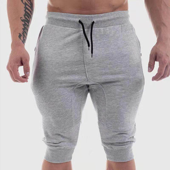 Gray Fashion Sports Fitness Shorts for Men, cotton material, mid-length, elastic waist, drawstring, activewear.