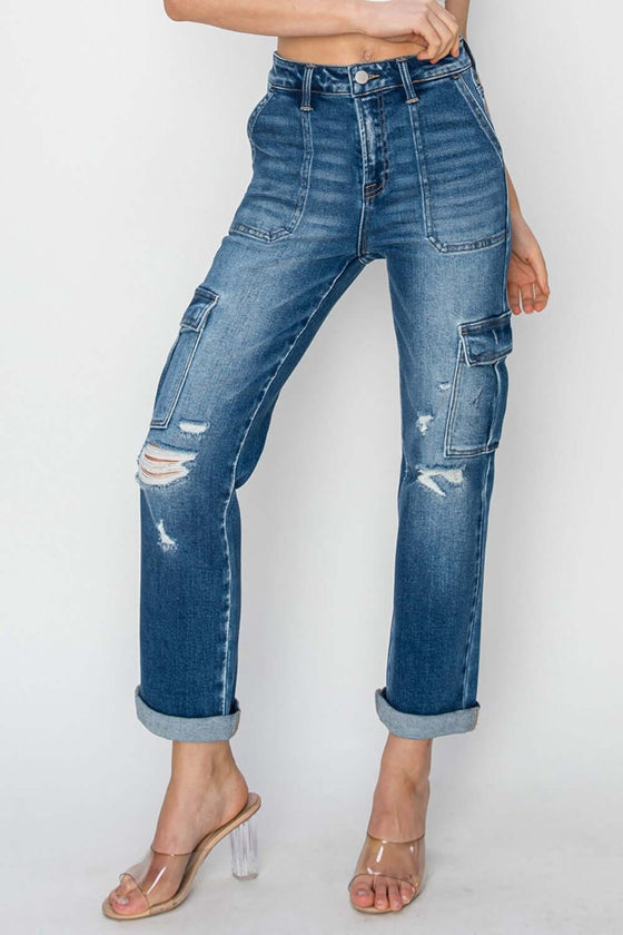 Women's Full Size High Rise Cargo Ankle Roll Up Straight JeansElevate your wardrobe with the trendy and functional RISEN High Rise Cargo Ankle Roll Up Straight Jeans. The high-rise fit accentuates your waist while providing comDenim JeansPlush Fashion ShopPlush Fashion ShopFull Size High Rise Cargo Ankle Roll