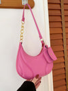 PU Leather Shoulder Bag with EarPods Bag in pink hanging on a hook