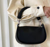 Female high-end retro diagonal handbag in black artificial leather, Japanese and Korean style.