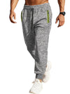 Men's sports trousers with cationic fabric, zipper cuffs, and slim fit design.