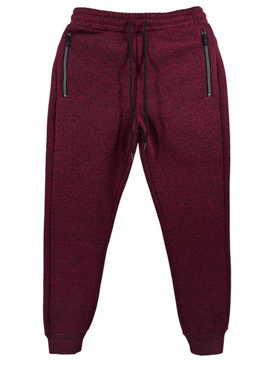 Men's casual cationic sweatpants with zipper cuffs and slim fit, maroon color.