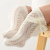 Baby Girls Long Bow SockWrap your little one's feet in soft cotton with our Baby Girls Long Bow Sock. These knee-highs feature a Spanish-inspired design with delicate lace detailing, perfecSocksPlush Fashions ShopPlush Fashion ShopBaby Girls Long Bow Sock